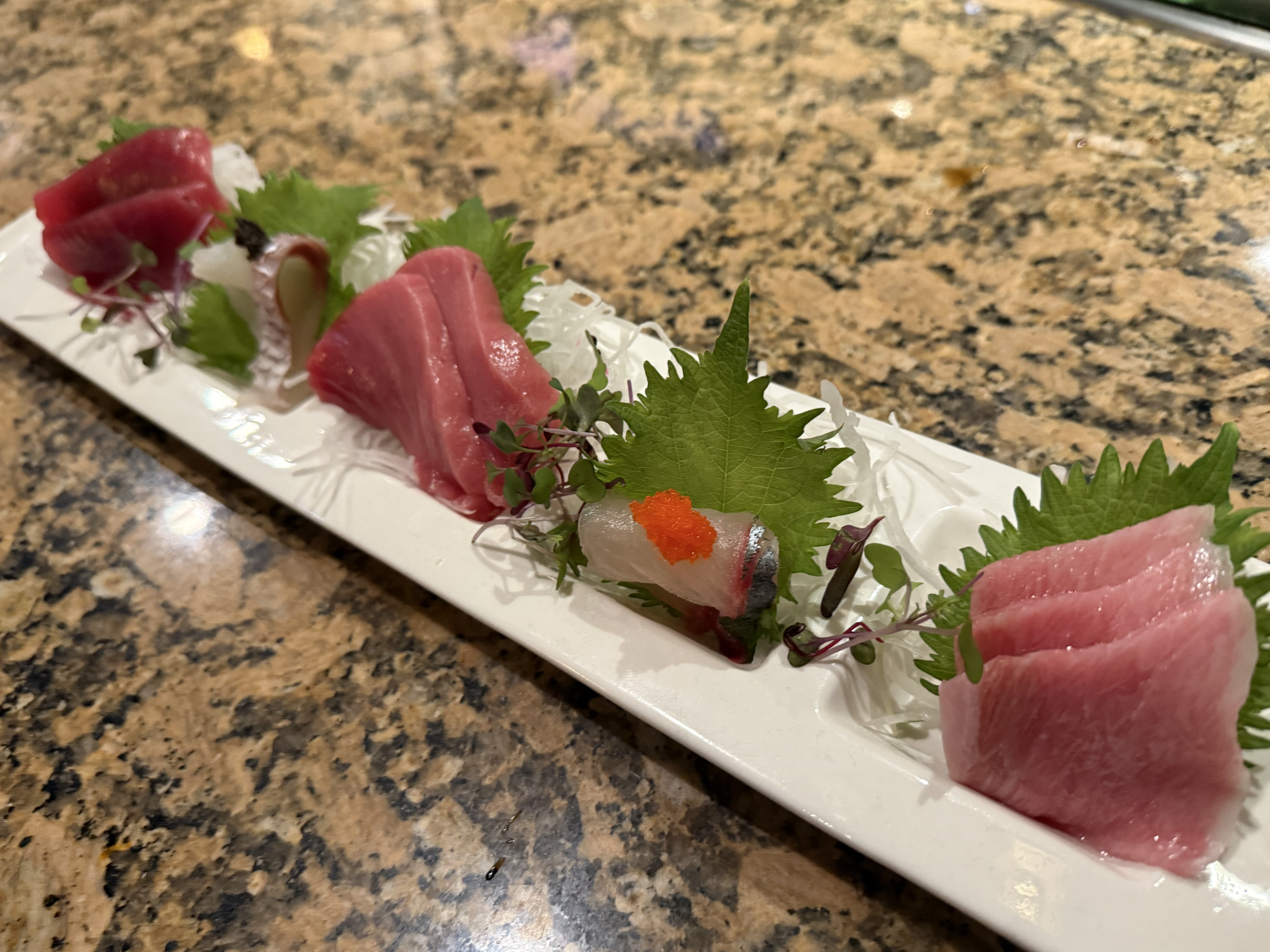 Tuna sashimi platter with shiso leaves